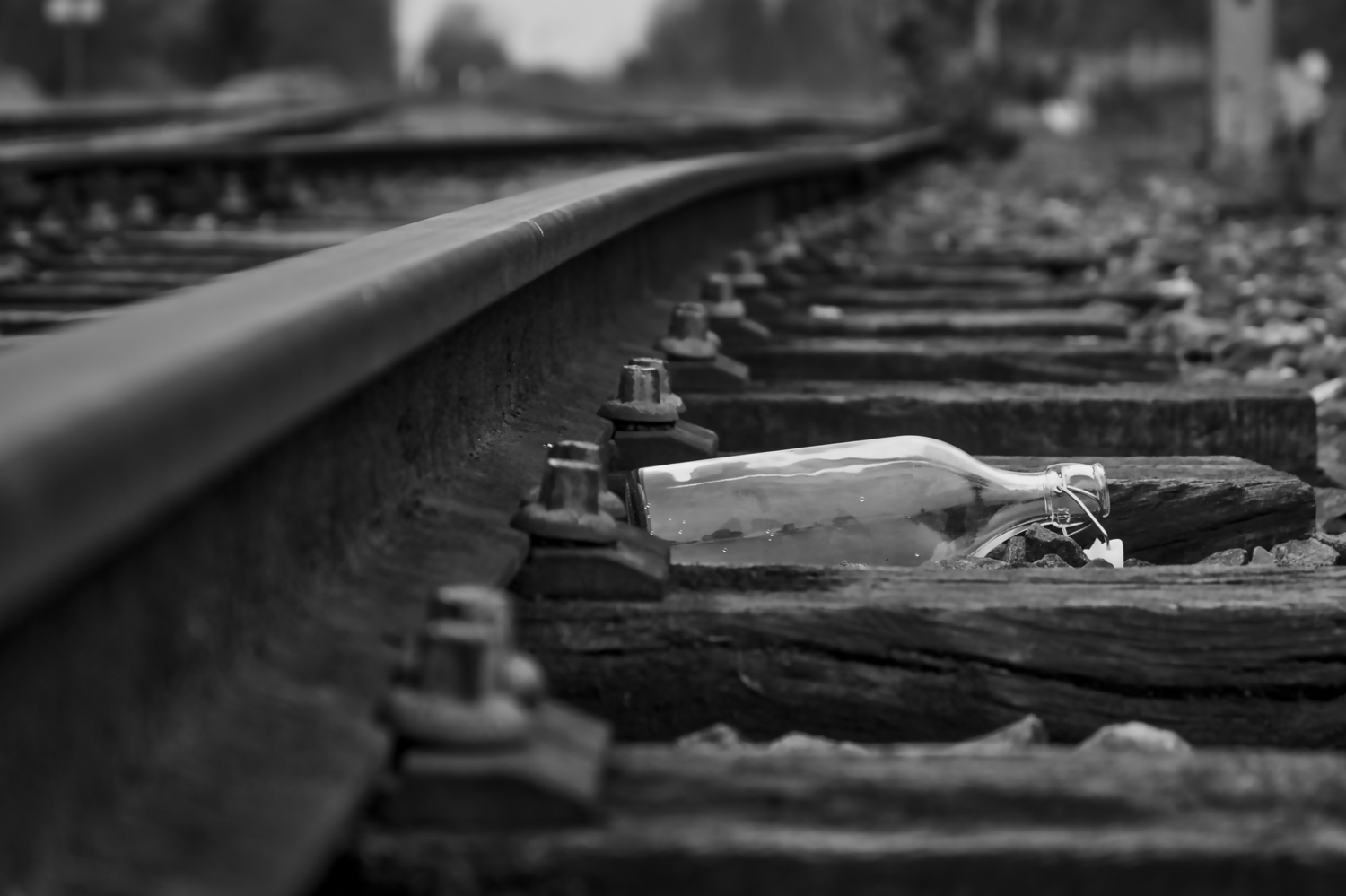 Bottle along a railway line